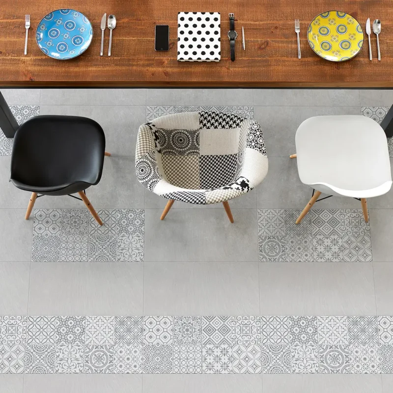 Dining wooden table, color porcelain plates, phone, watch and notebook