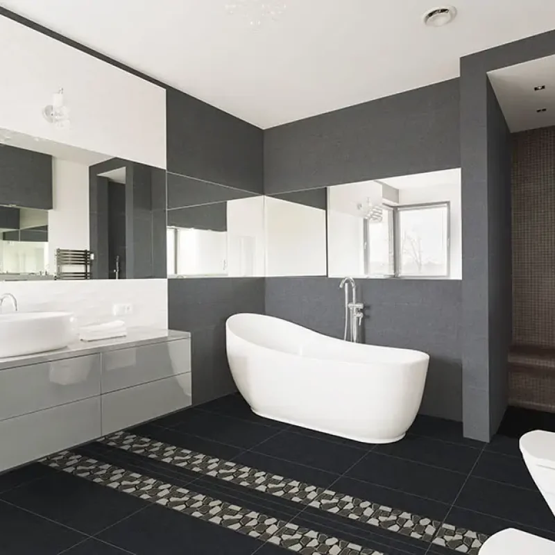 White and grey exclusive big washroom with fancy bath